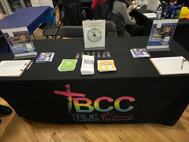 TBCC community outreach table at an event